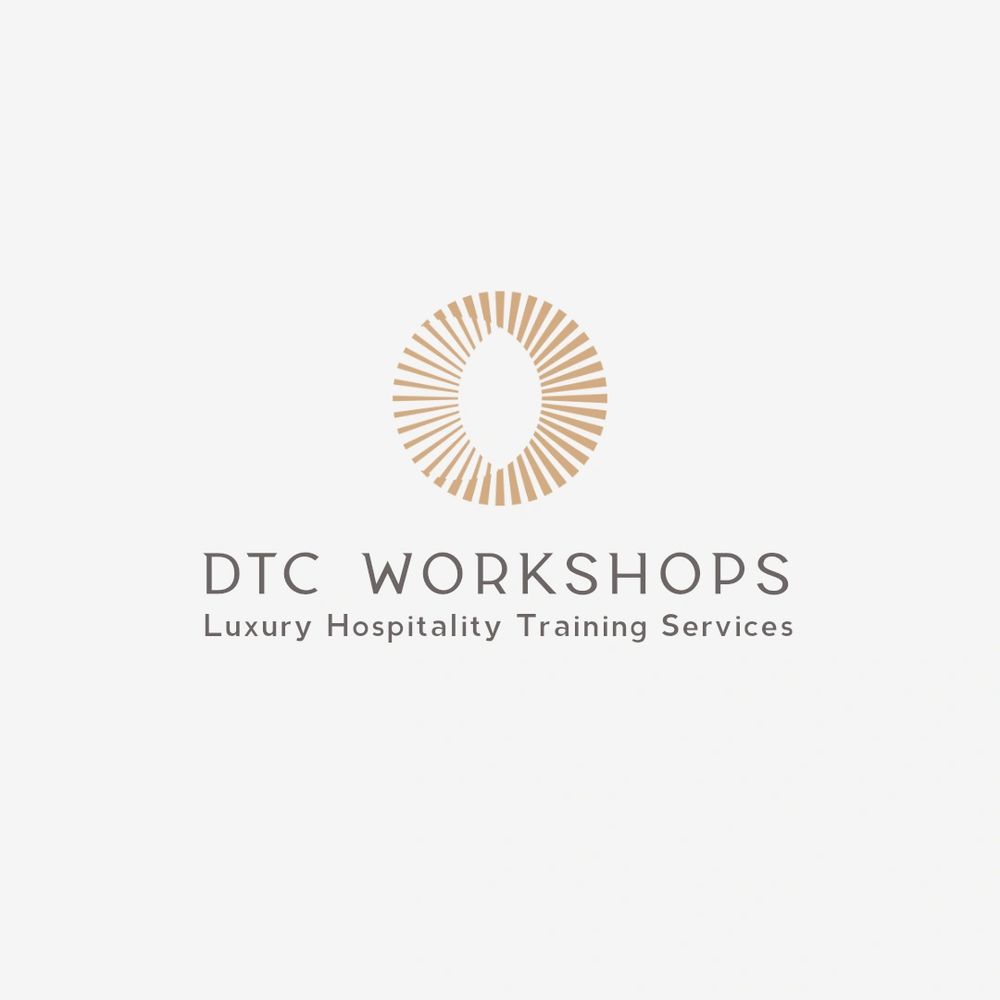 Elegant logo for DTC Workshops, specializing in luxury hospitality training services.