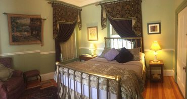Queen bed with private bathroom and easy step-in shower