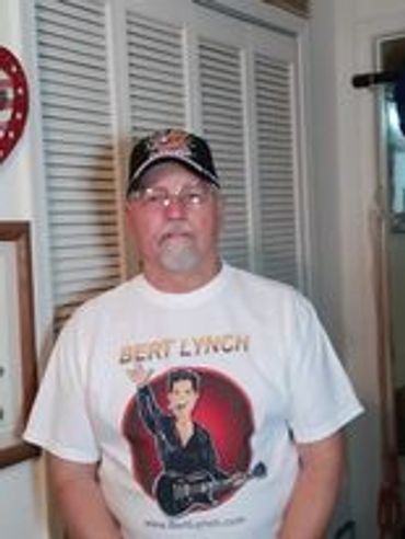 Robert Land with his Bert Lynch White Logo T-Shirt 