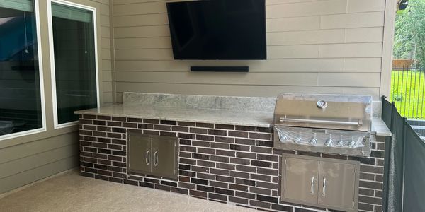 "Crafting Culinary Havens: Elevate your outdoor living with a kitchen that blends the art of cooking