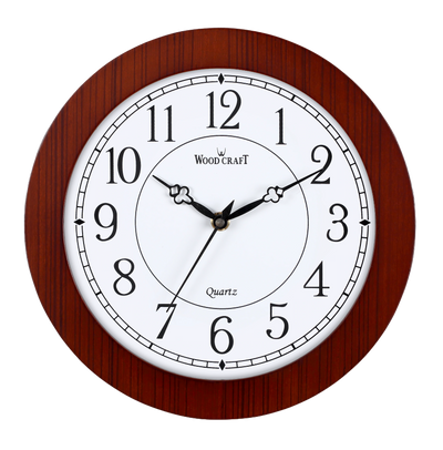 Round-shaped wooden clock of small size. Elegant wooden frame that will suit any type of furniture.