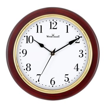 Small round wooden wall clock of dark brown colour & white dial. Has a golden ring around the frame