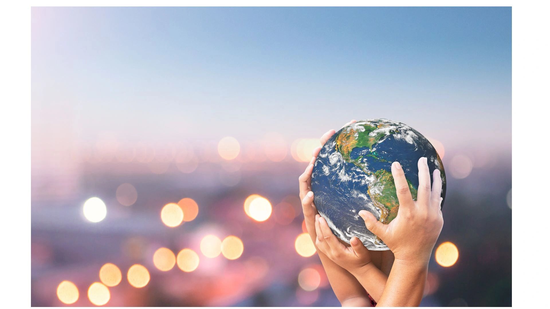Planet earth hold by some hands
