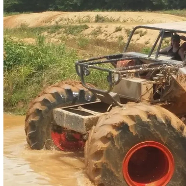 Off road vehicle in mud