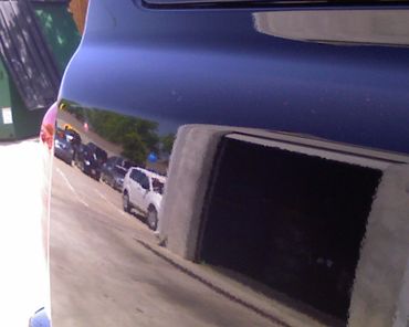 Before and after paintless dent repair on quarter panel in Plano TX