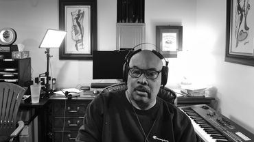 Lights, keyboard, and a half-empty glass of water. Who could ask for more?