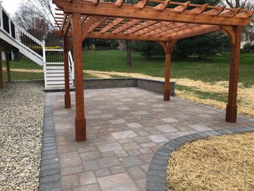 Paver patio with seat wall and cedar pergola