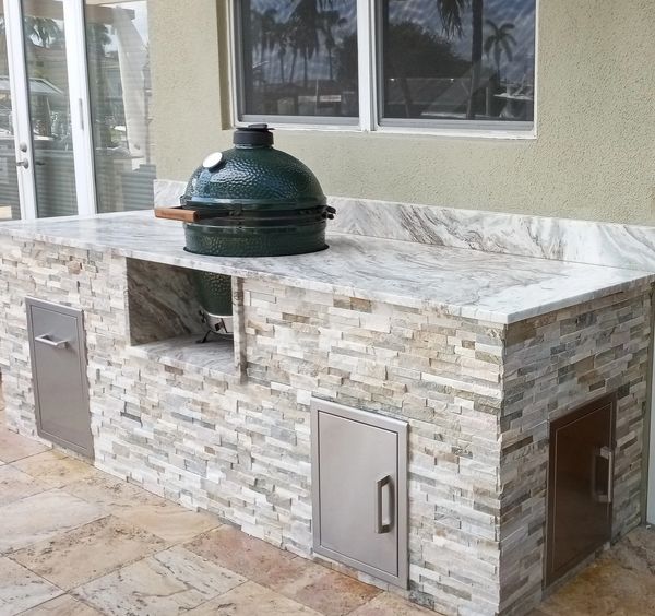 outdoor kitchen with smoker