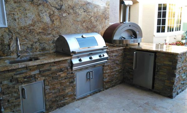Heart Pizza oveStone, Fire magic grill, refrigerator and doors.
