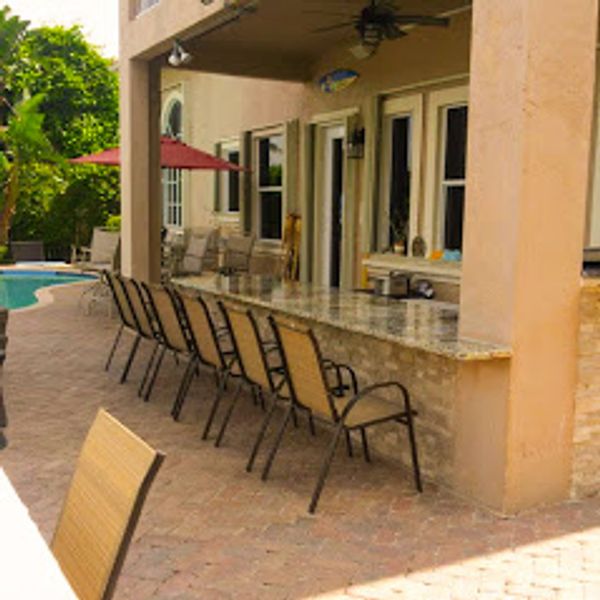 Outdoor grill bar wit chairs