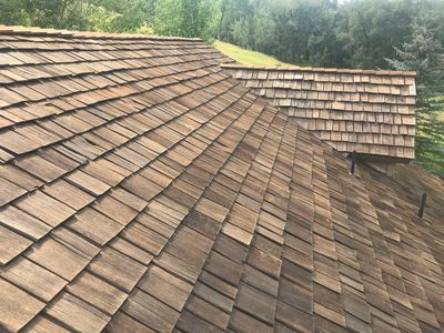A cedar roof in Beaver Creek that was stained after being washed.