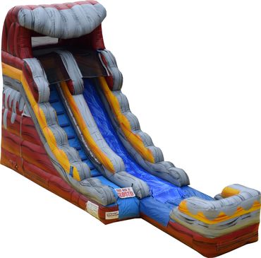 Inflatable slide with a sign saying 'This ride is closed'.