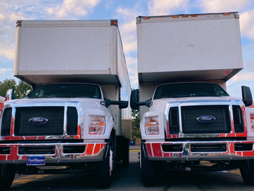 two 26 ft moving trucks