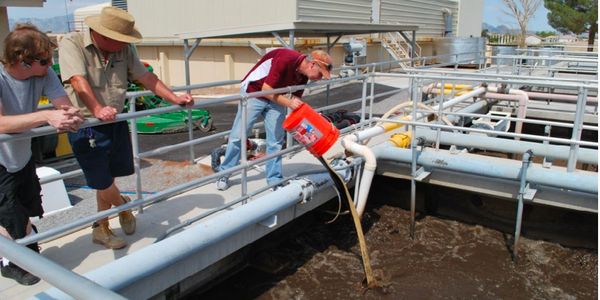Natura Solve WaterMix being poured into industrial wastewater tank