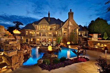 Free Form style pool and tropical staycation right in your backyard.