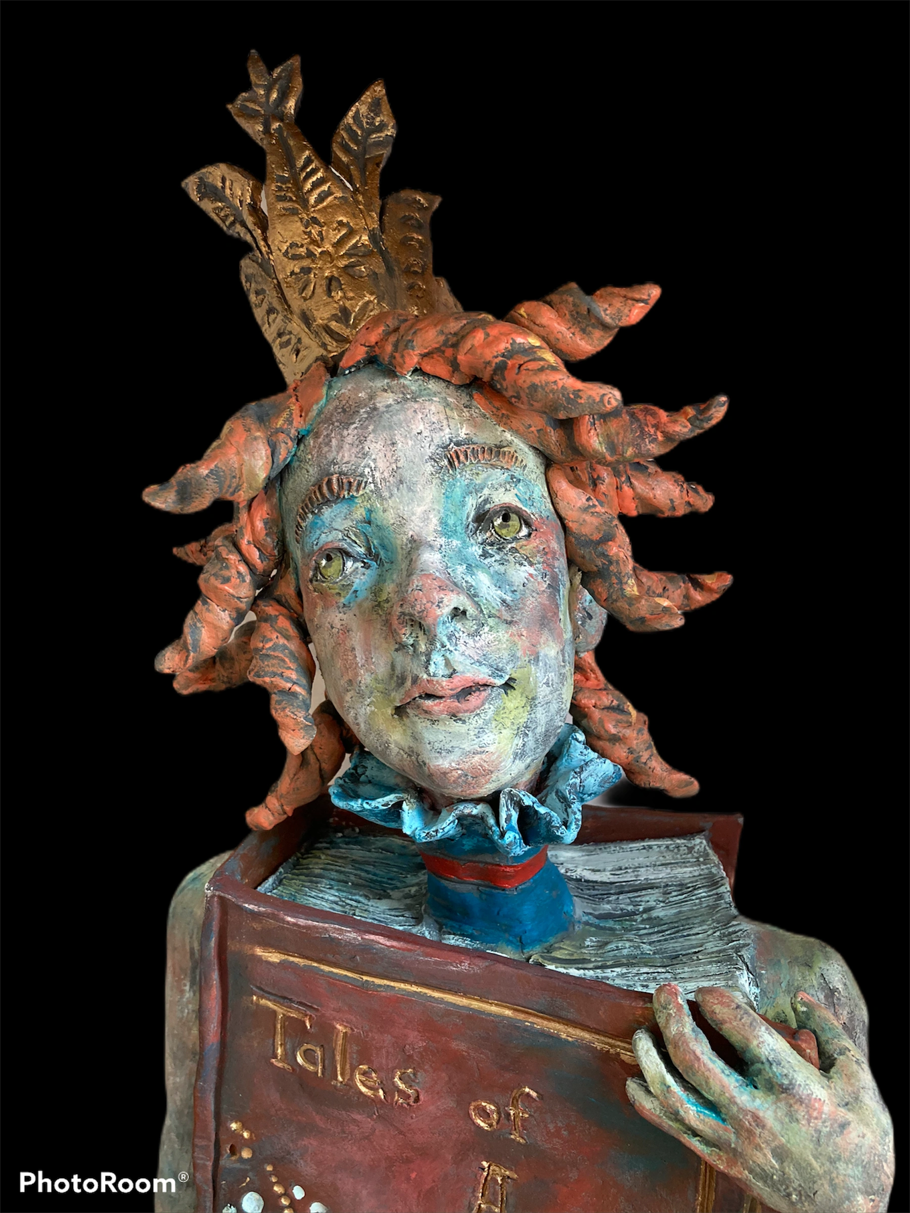 Whimsical ceramic figurative sculpture of a girl telling her story.