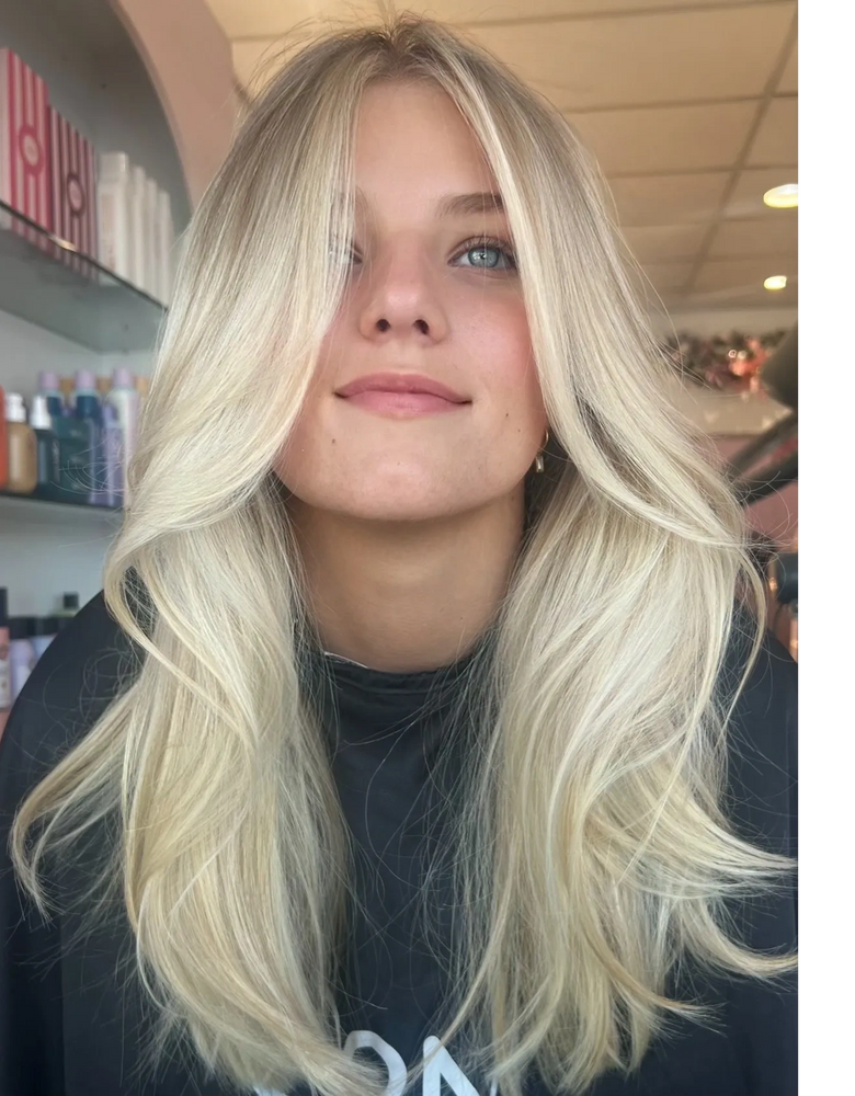 pretty bright blonde hair done with foils at studio sterling