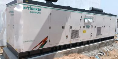 Large Kirloskar Powergen industrial generator installed outdoors.