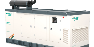 A large white Kirloskar diesel generator with ventilation and exhaust system.