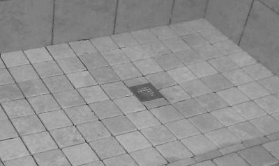 Shower  Installed with Mortar Based Products: Standard thin-set, and Custom blend grout. (Standard)