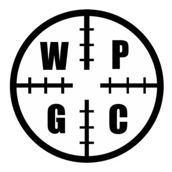 Circle with four letters and crosshair markings.