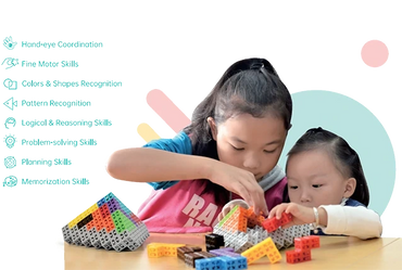 Two children building with colorful blocks, enhancing various cognitive skills.