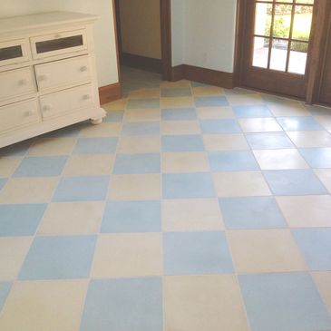 light blue tile and cream tile in checkerboard pattern
