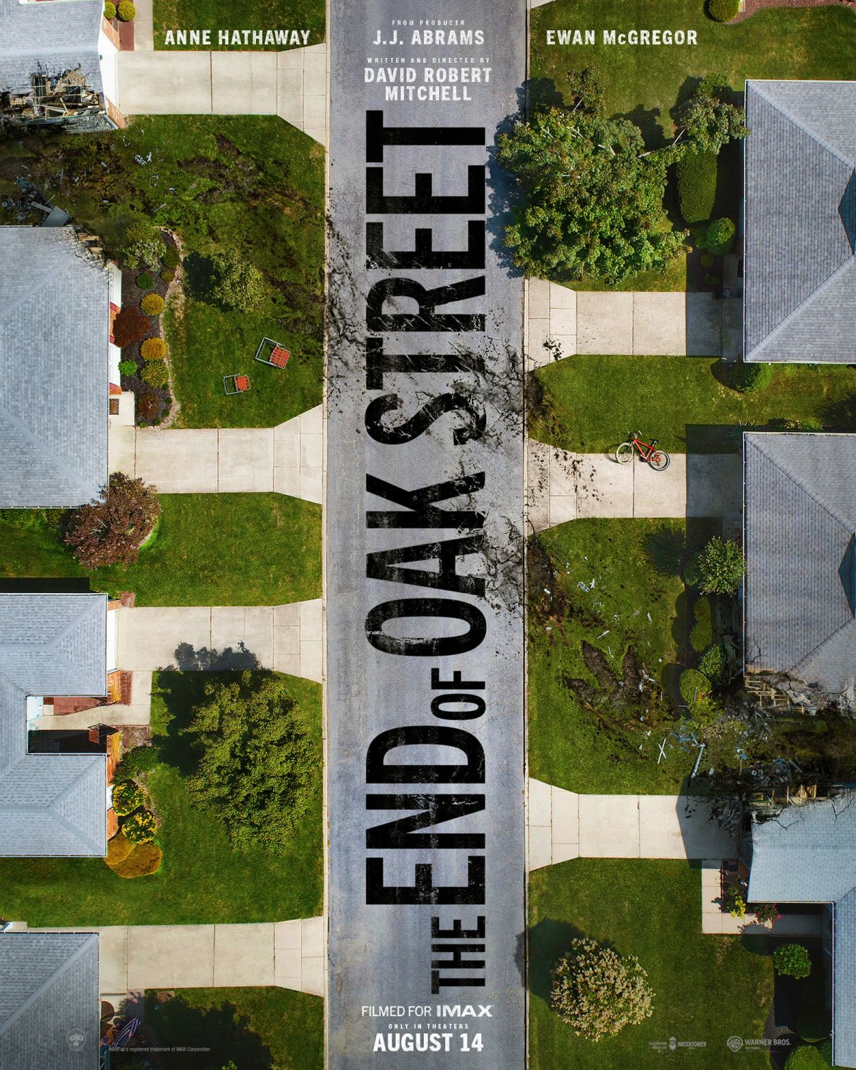 Aerial view of suburban street with movie title.