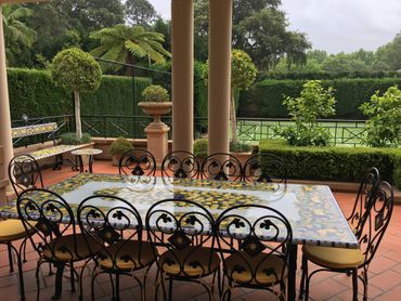 One of several original designs done on volcanic stone table tops.