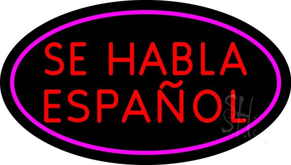 Neon sign saying 'Se Habla Español' in red and purple colors.