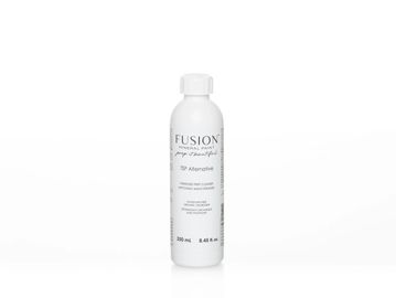 White bottle of Fusion Hair Care product on a white background.