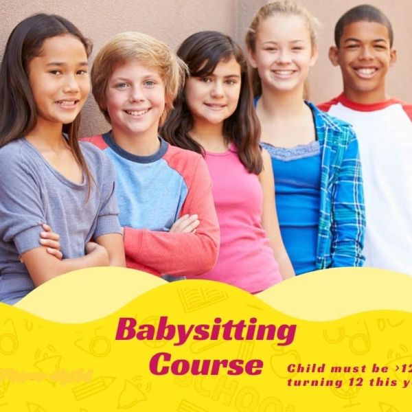 Group of kids promoting a babysitting course.