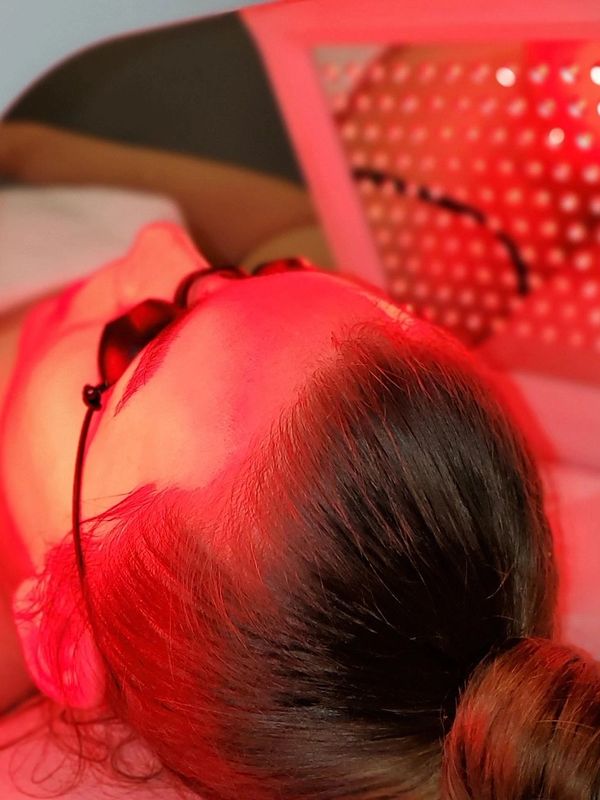 Red light therapy for skin healing and cell renewal.
