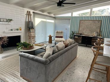 Cozy living room with neutral tones and natural light.