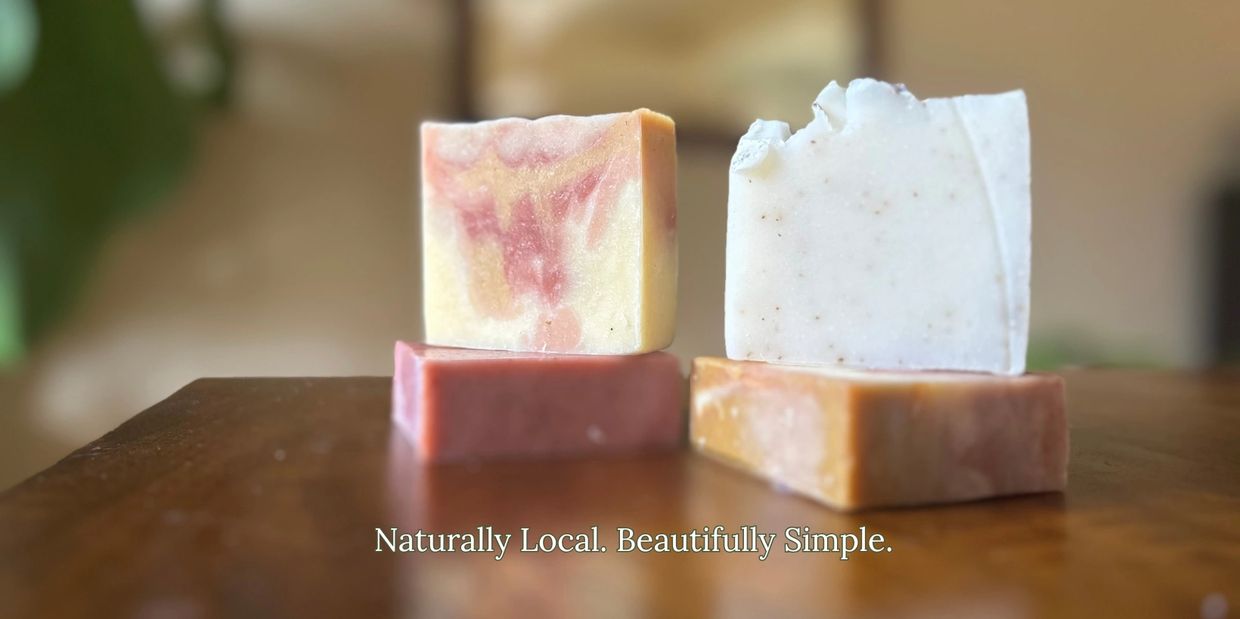 Two bars of daily-use soap on wooden surface with text overlay.