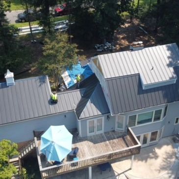 Installing a standing seam metal roof in Charlotte, NC.