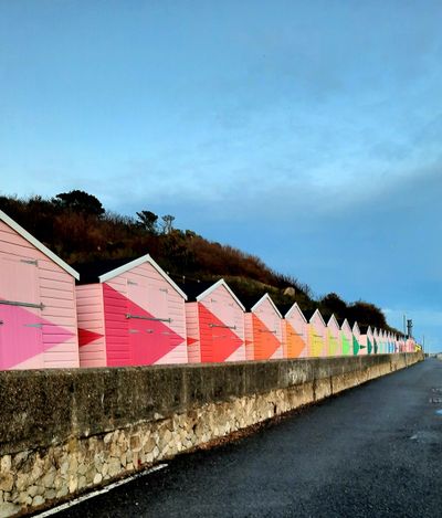 Wooden houses with rainbow colors