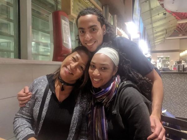 Robert Holloway with his sister and mother, preparing to leave for South Korea
