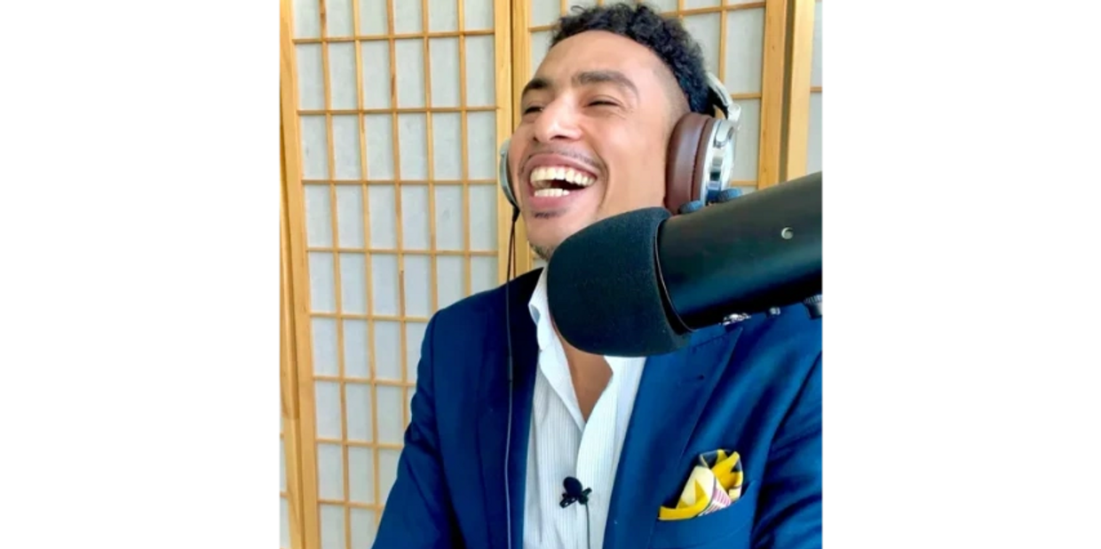 Robert Holloway laughing during an interview