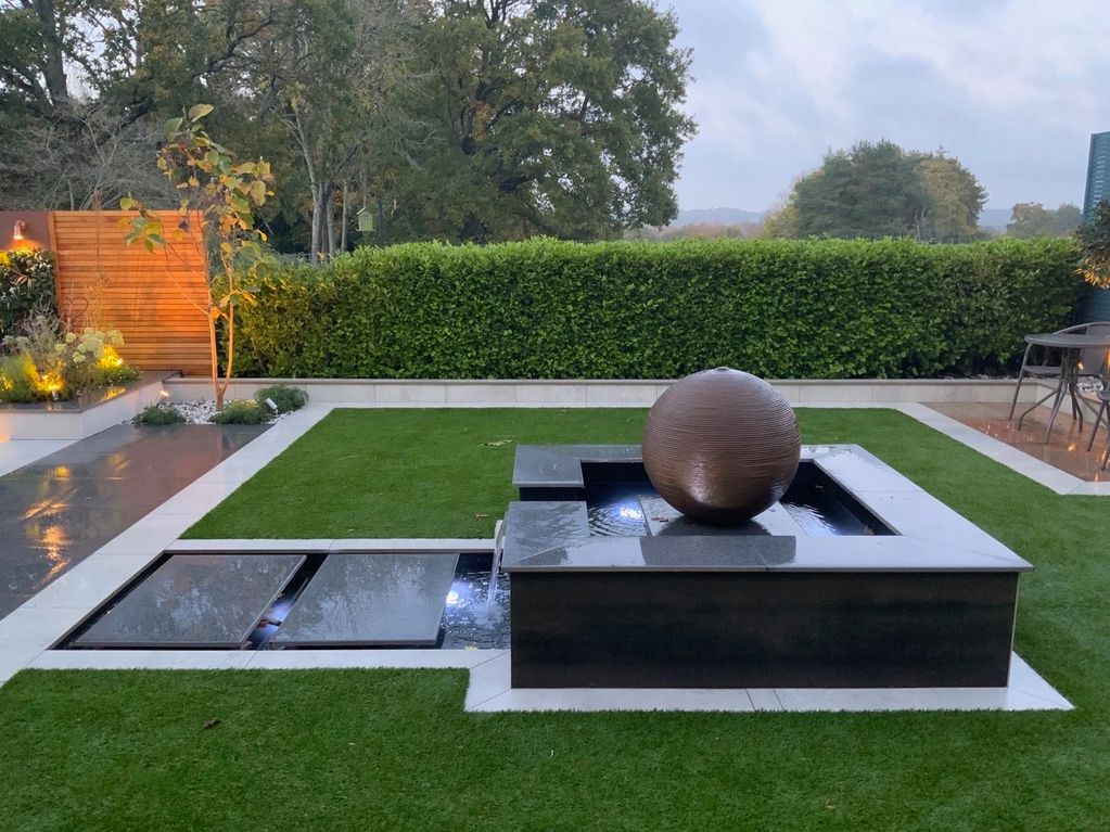 Water Feature Floating Porcelain Tiles & Copper Ball Veneered in Luxury Designclad & Porcelain