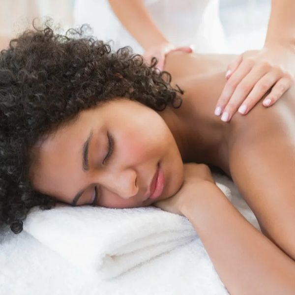 Woman enjoying a relaxing massage.