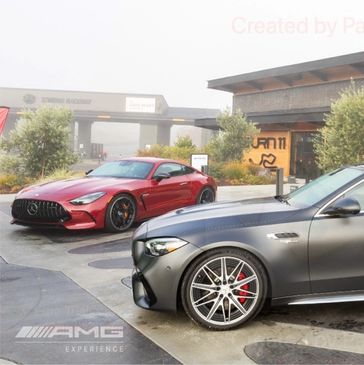 Two mercedes benz s class coupes parked in front of a building