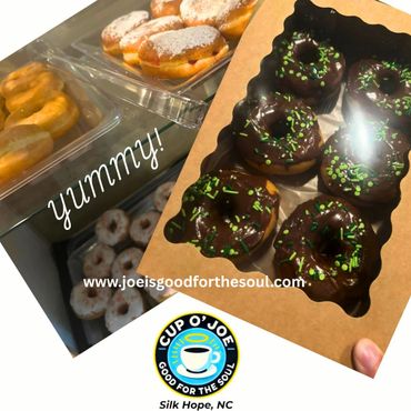 Assorted donuts including chocolate glazed with green sprinkles from Cup O' Joe in Silk Hope, NC.