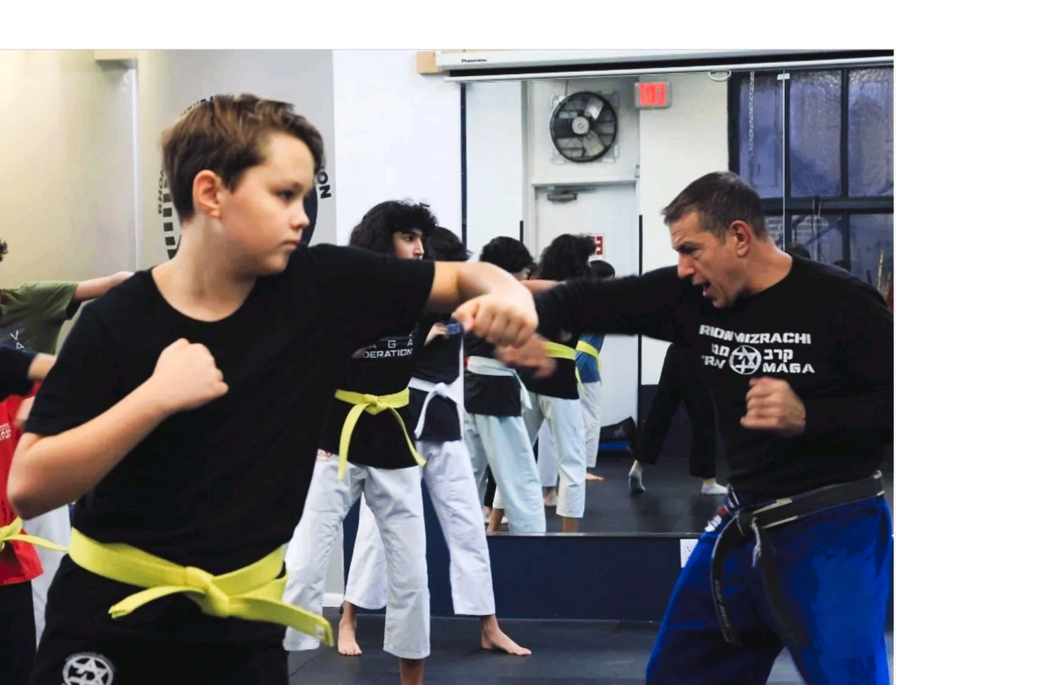 Class of Krav Maga kids training in class with Master Rhon Mizrachi at the Krav Maga Federation