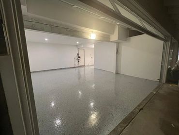 Garage remodeling with drywall installation and painting to create a functional and finished space.