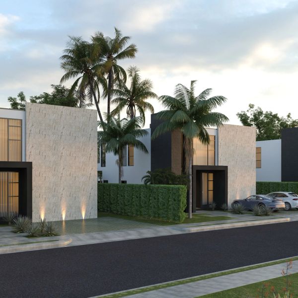 Conjunto moderno de casas con palmeras y autos.