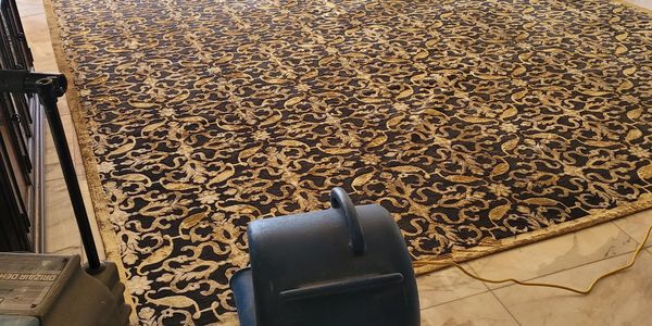 This is a fan drying a rug