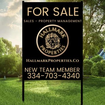 Hallmark Properties sign that has "new team member" written on it. New Real Estate Agent Advice