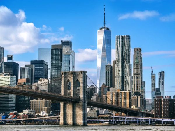 Brooklyn Bridge with Manhattan skyline in the background.