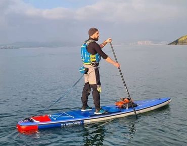 Carwyn paddleboarding